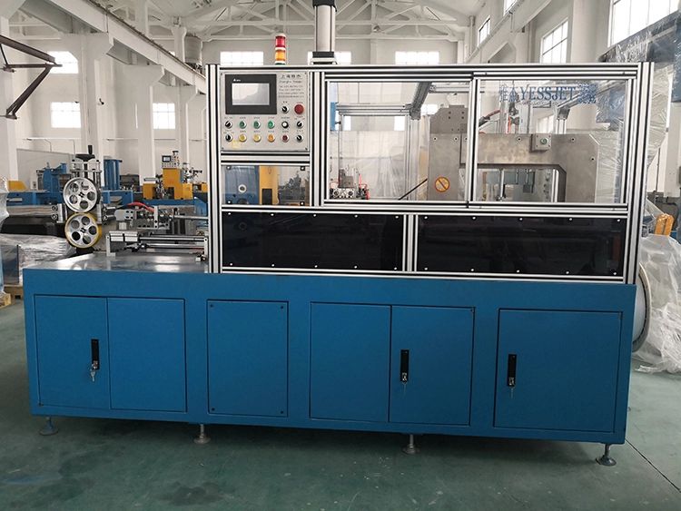 Full automatic coiling binding & wrapping machi